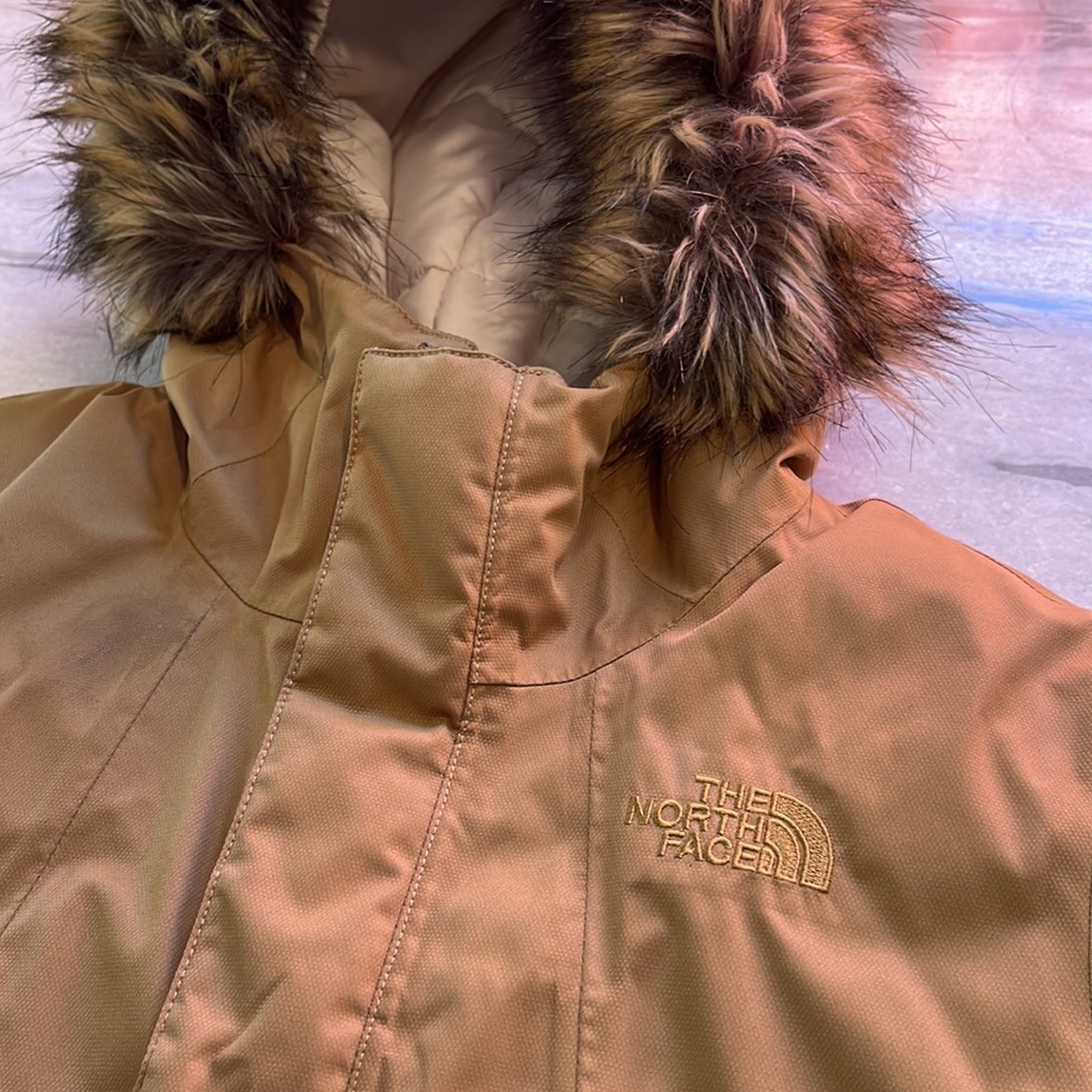 Tan colored authentic Kids North Face coat with fur